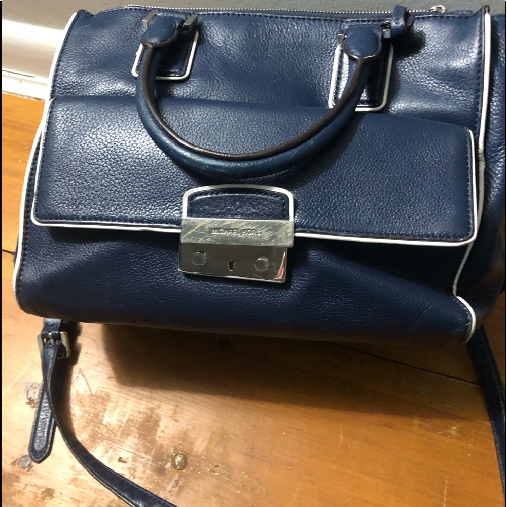 Navy blue leather Michael Kors bag with white trim